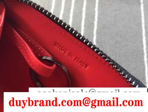 素敵なルブタン財布コピーCHRISTIAN louboutinラウンドファスナーミニ財布スパイクスグラデーション